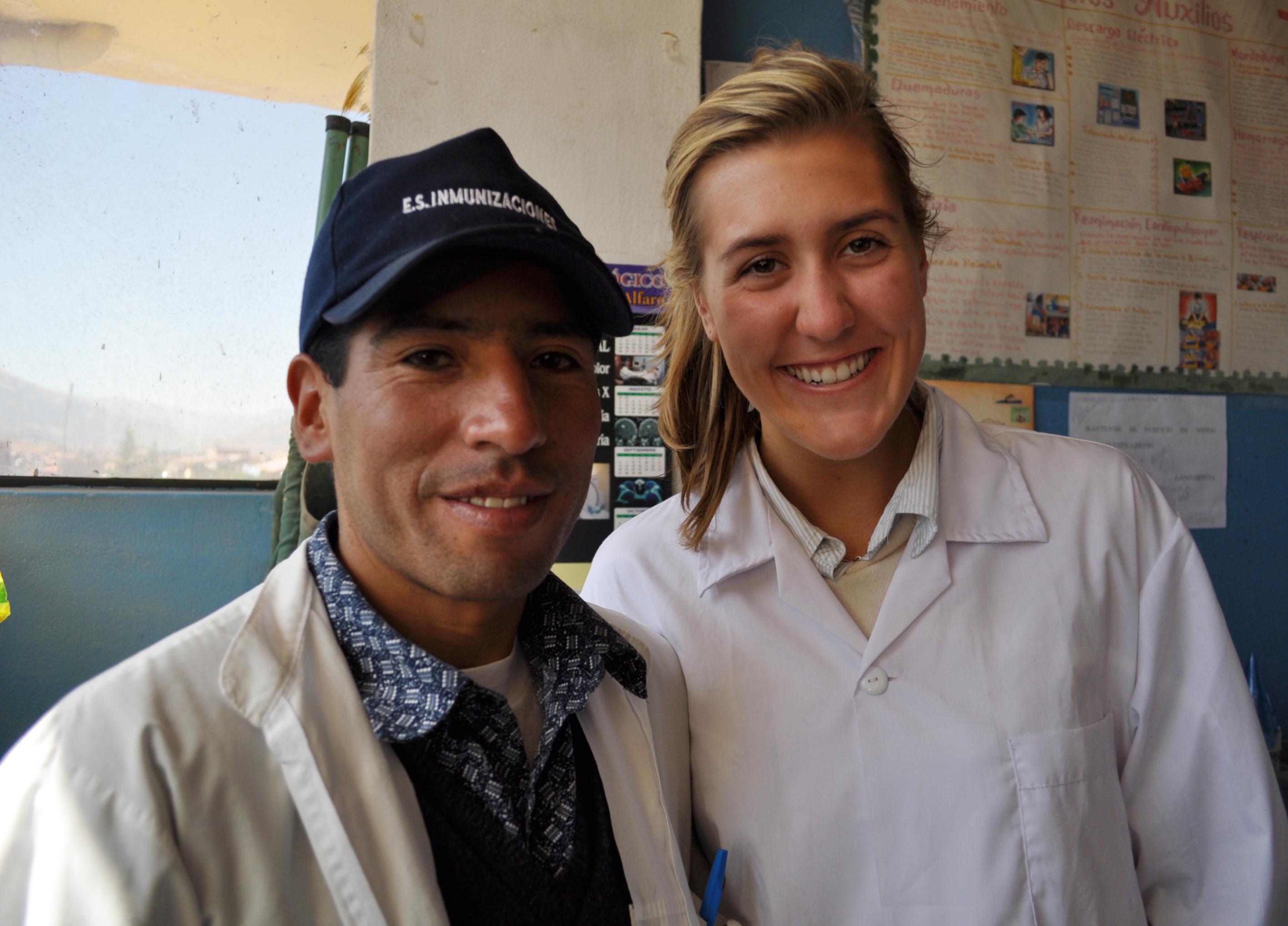 A female medical intern takes a pictue with a local doctor during her nursing internship in Peru with Projects Abroad. Projects Abroad intern takes a photo with a local doctor during her nursing internship in Peru.